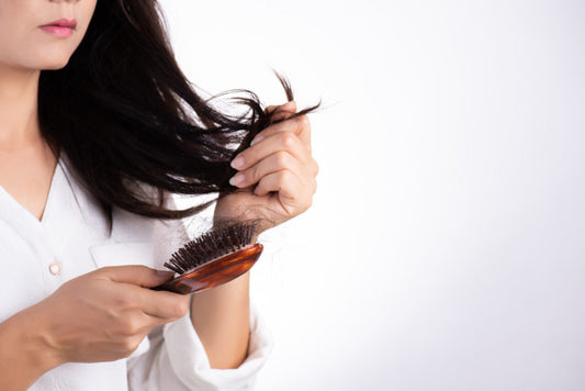 How to Stop Hair Fall Using Natural Hair Care Products