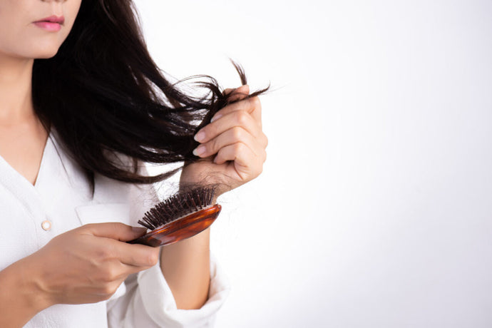 How to Stop Hair Fall Using Natural Hair Care Products